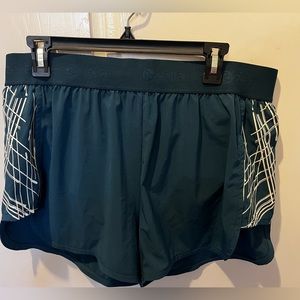 Zella Caribbean blue running shorts with blue/white design. Size:XL